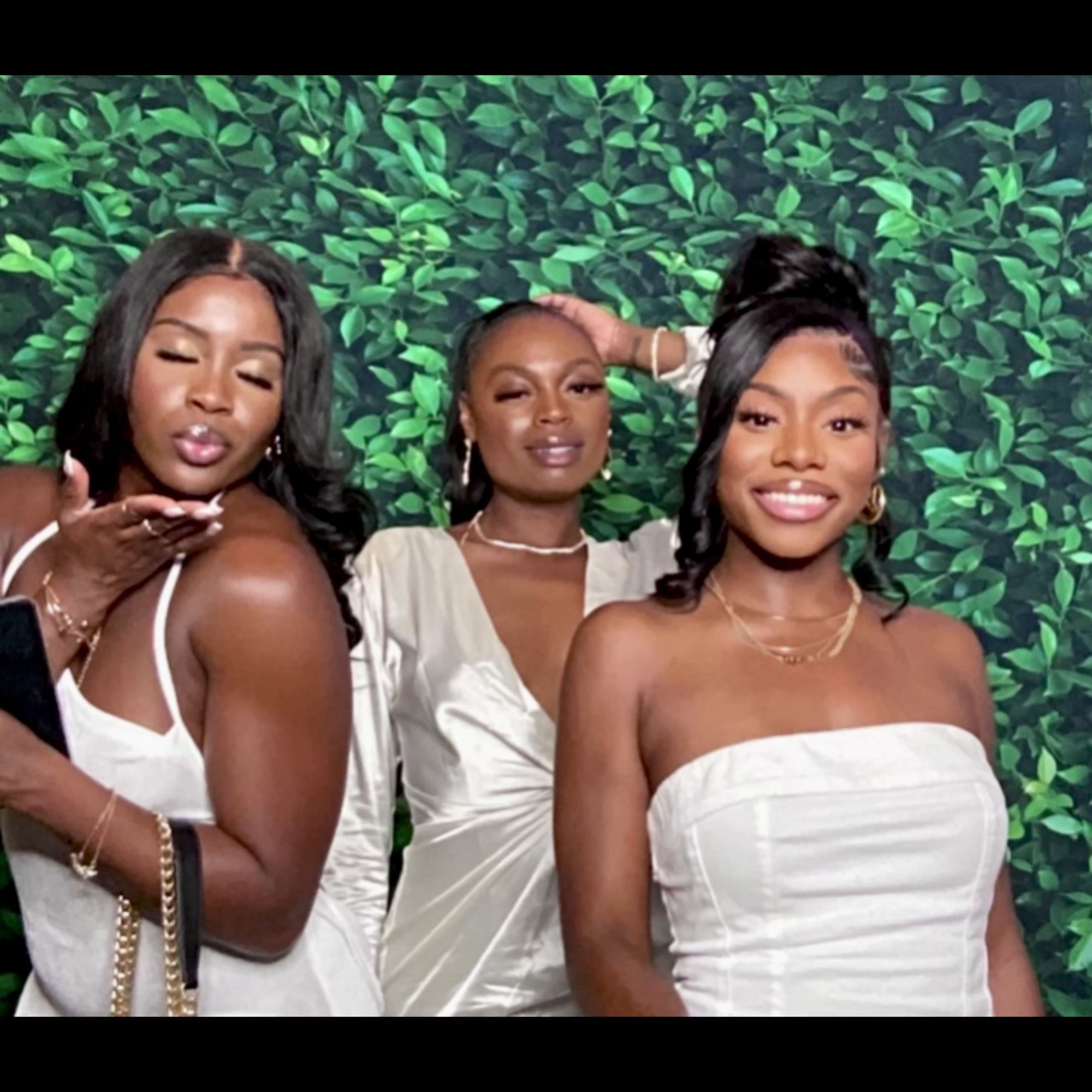 Guests using the digital selfie photo booth